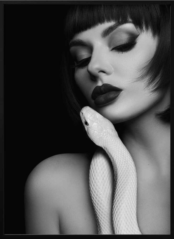 A woman and a snake — beauty wrapped in tension. Forbidden Embrace is minimal, provocative, and impossible to ignore.