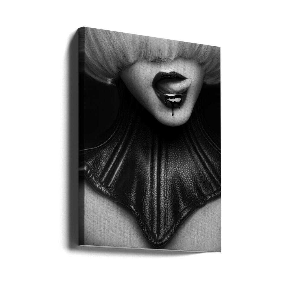 Dark, sensual and a little dangerous. Madame Noire focuses on lips with a piercing, captured in moody black and white. A statement piece for lovers of bold, rebellious art.