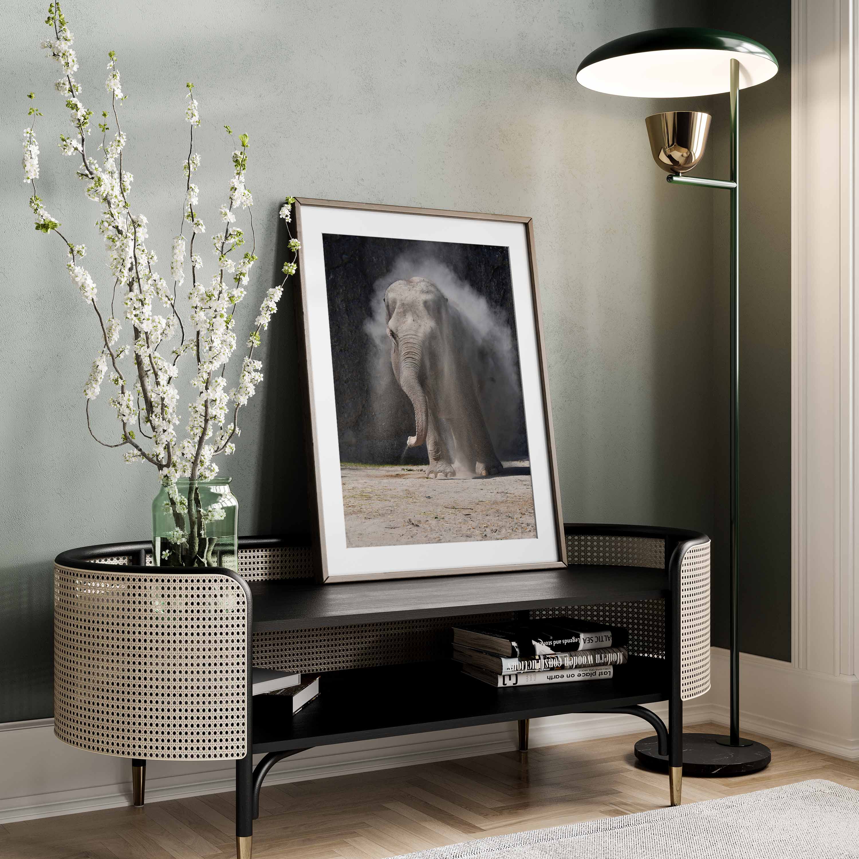 Black and white photography Poster of an elephant walking in the dust.