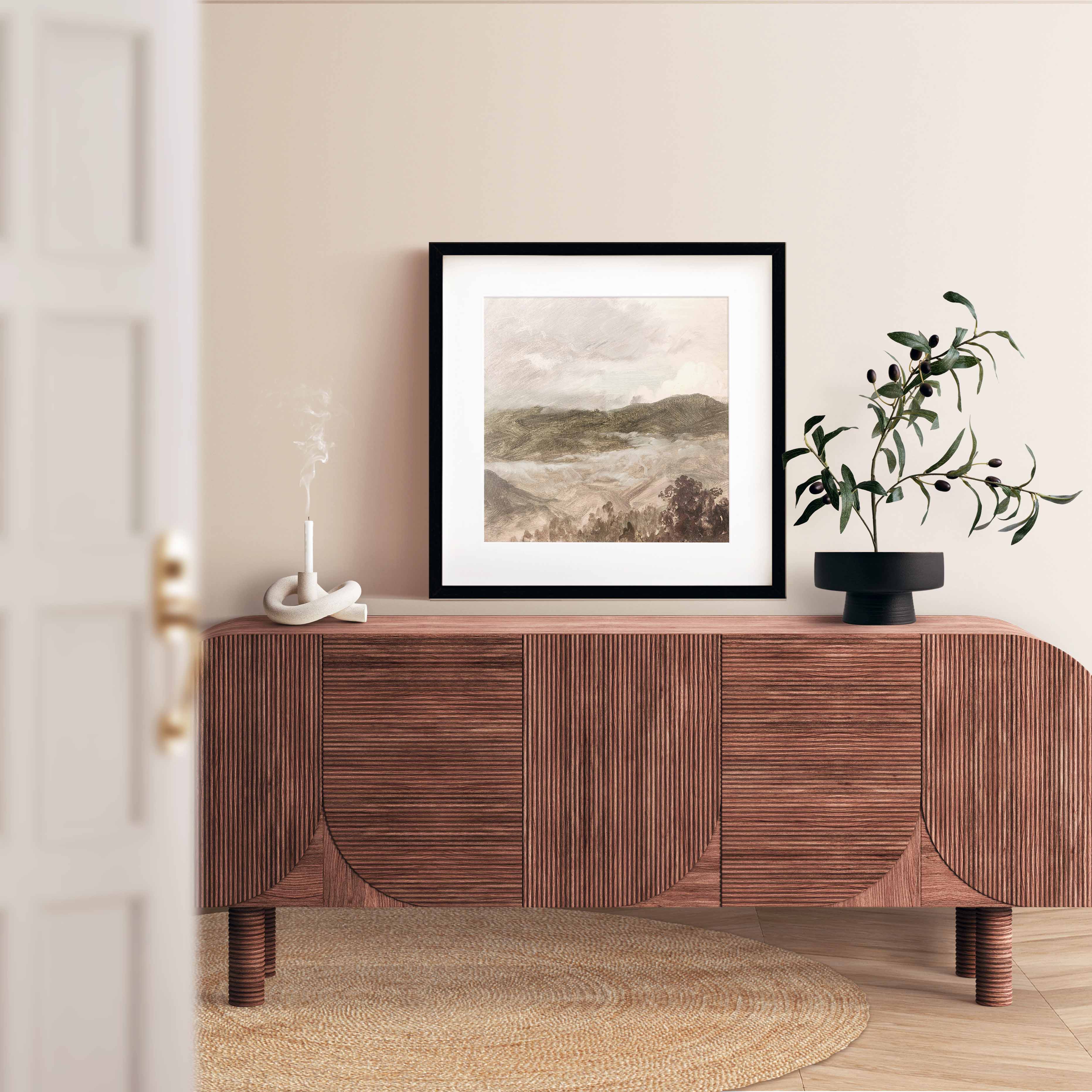 "Frog along the Hills" presents a tranquil scene with a frog nestled among rolling hills. The artwork captures a peaceful moment in nature, with soft colors and a serene mood.