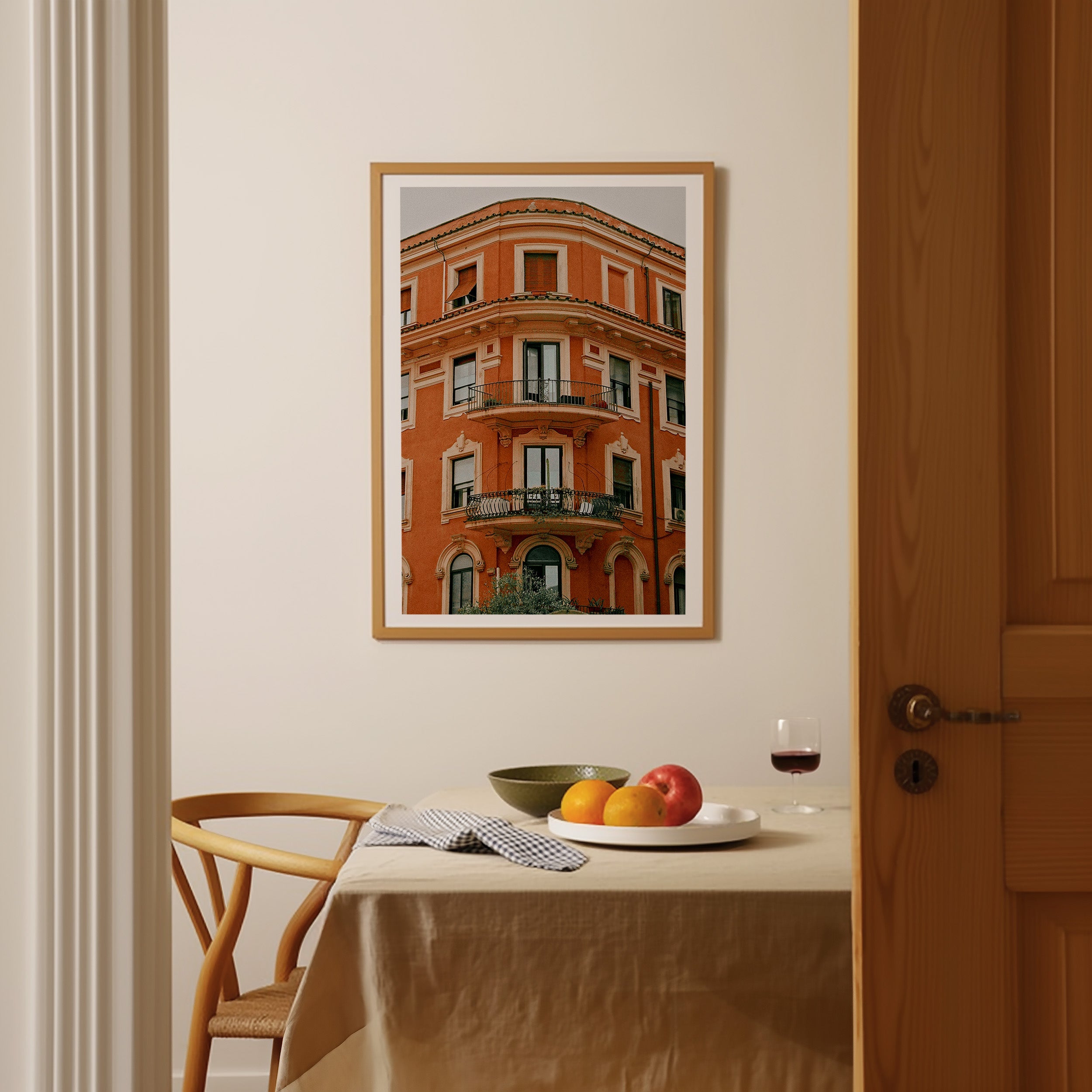 Photography print of an old orange building with balcony in Rome, Italy.