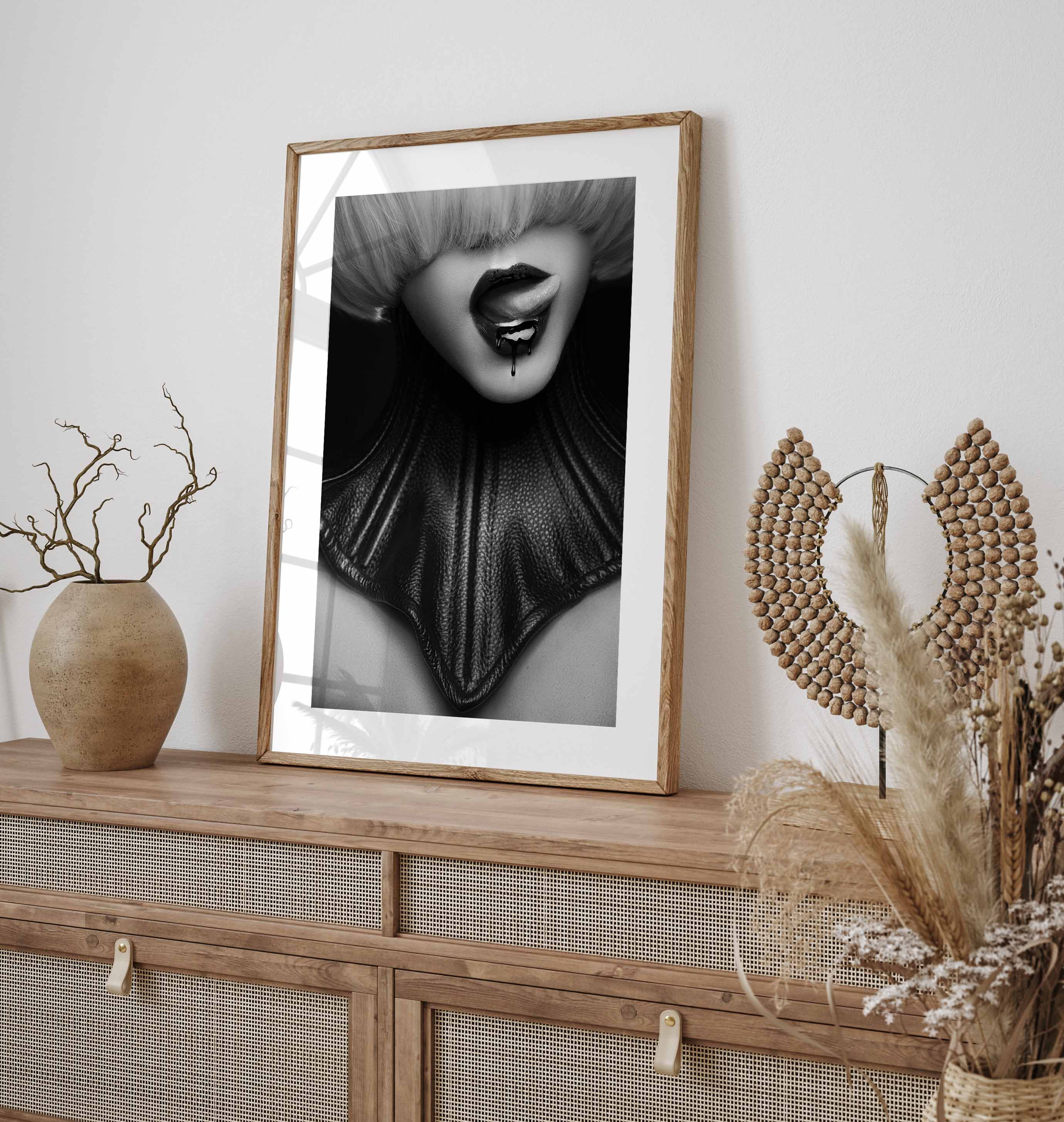Dark, sensual and a little dangerous. Madame Noire focuses on lips with a piercing, captured in moody black and white. A statement piece for lovers of bold, rebellious art.
