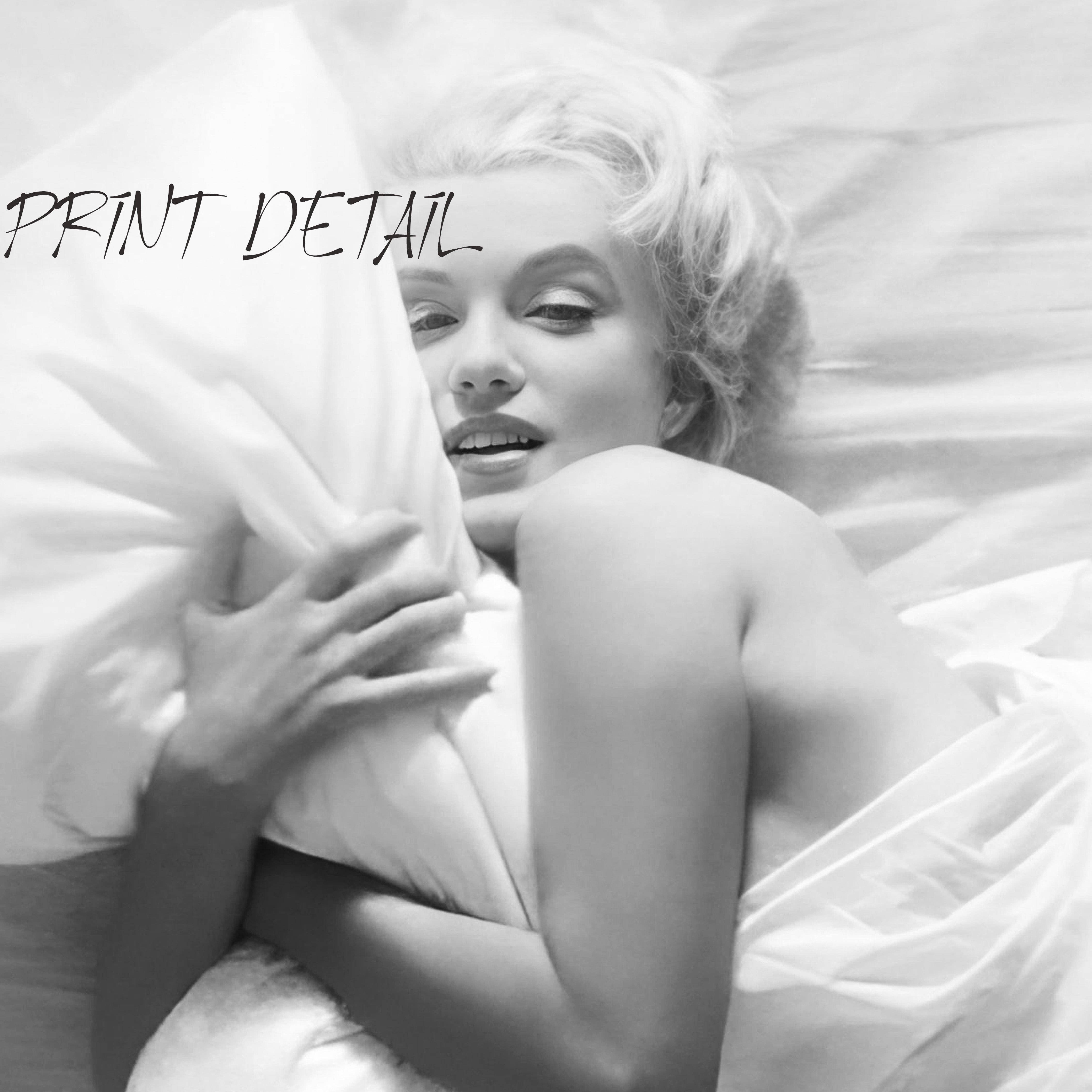 Black and white photography Poster of Marilyn Monroe hugging pillow in bed