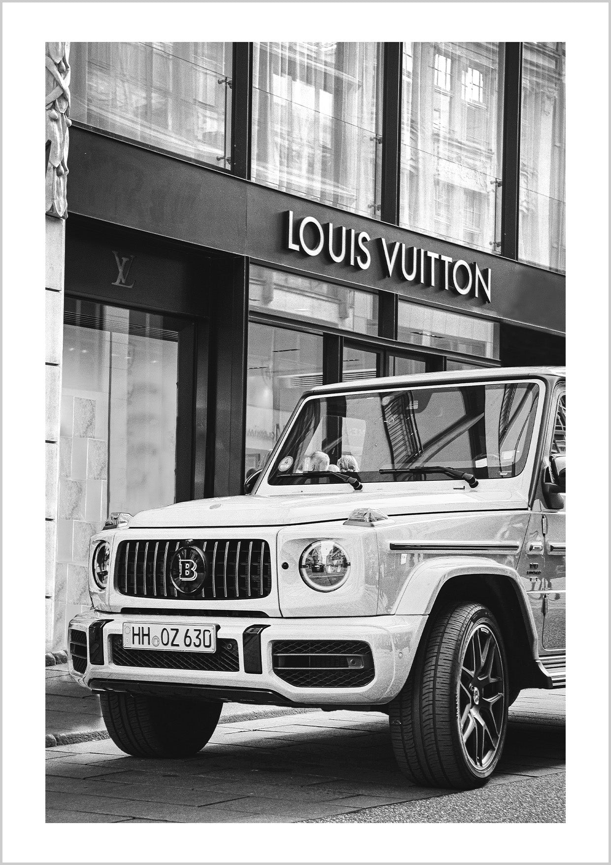 The "Mercedes G Wagon" print portrays a close-up of the iconic luxury SUV, capturing its bold lines and powerful presence.