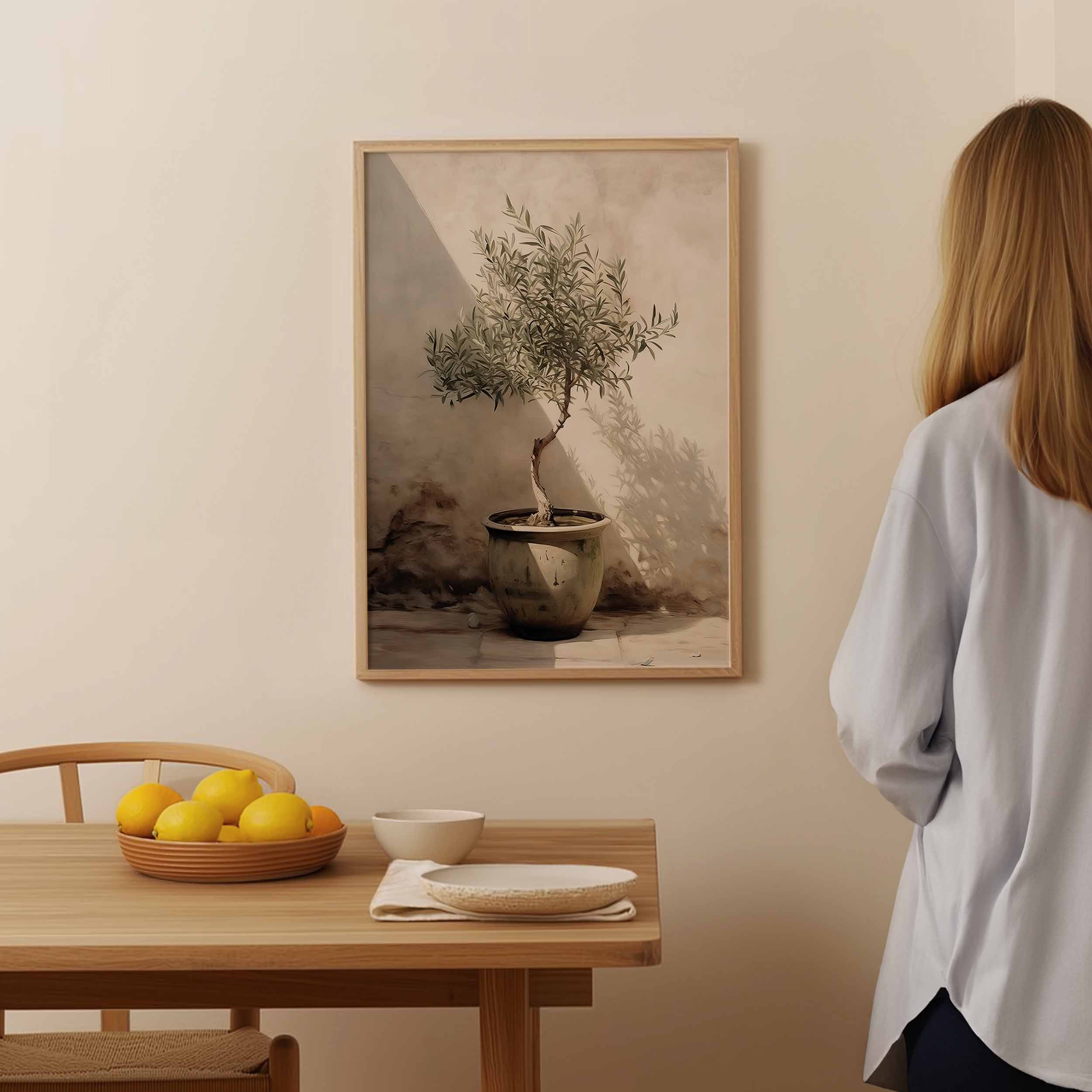Beautiful painting of an olive tree in a pot.