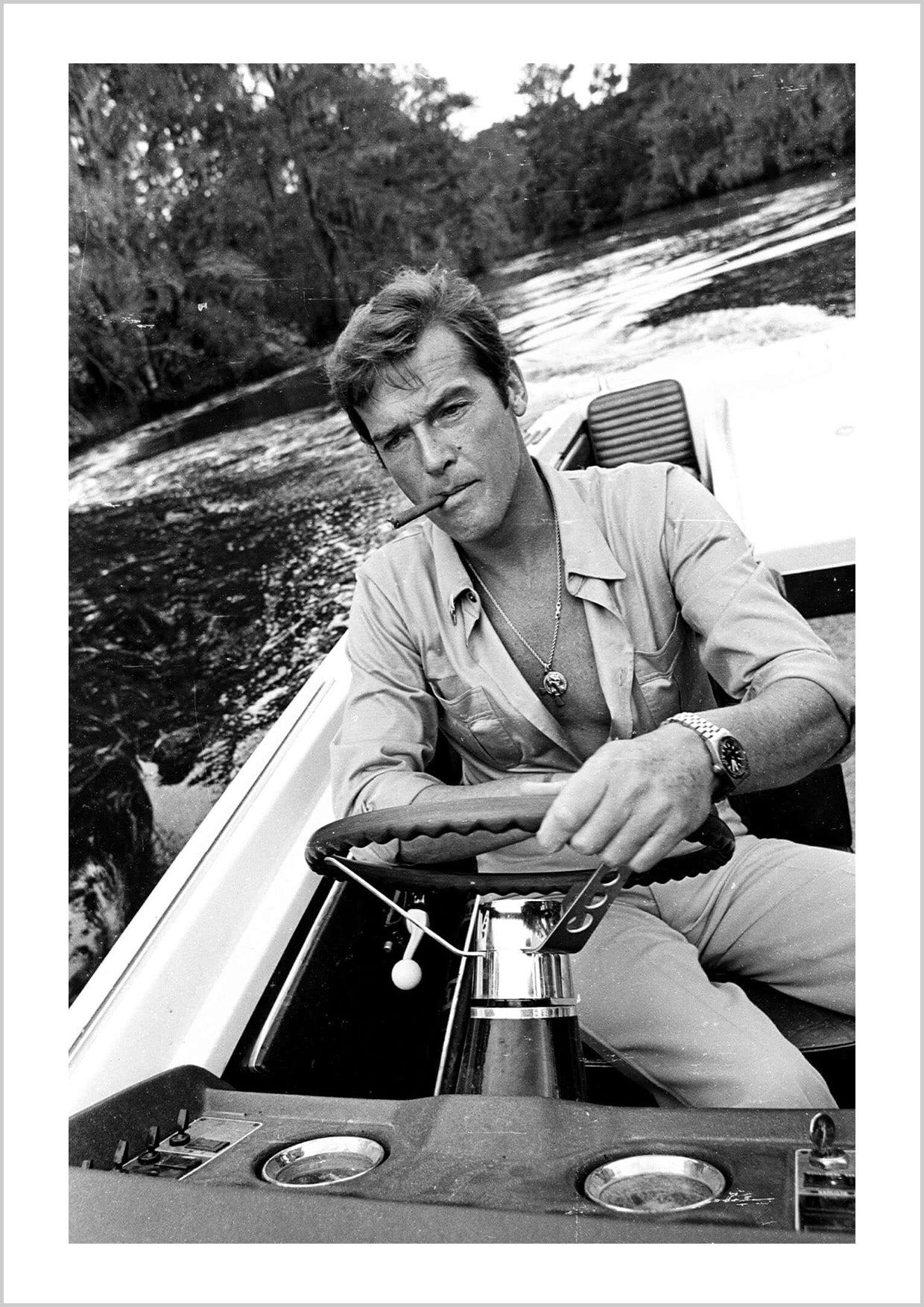 Roger Moore Driving Boat cigar