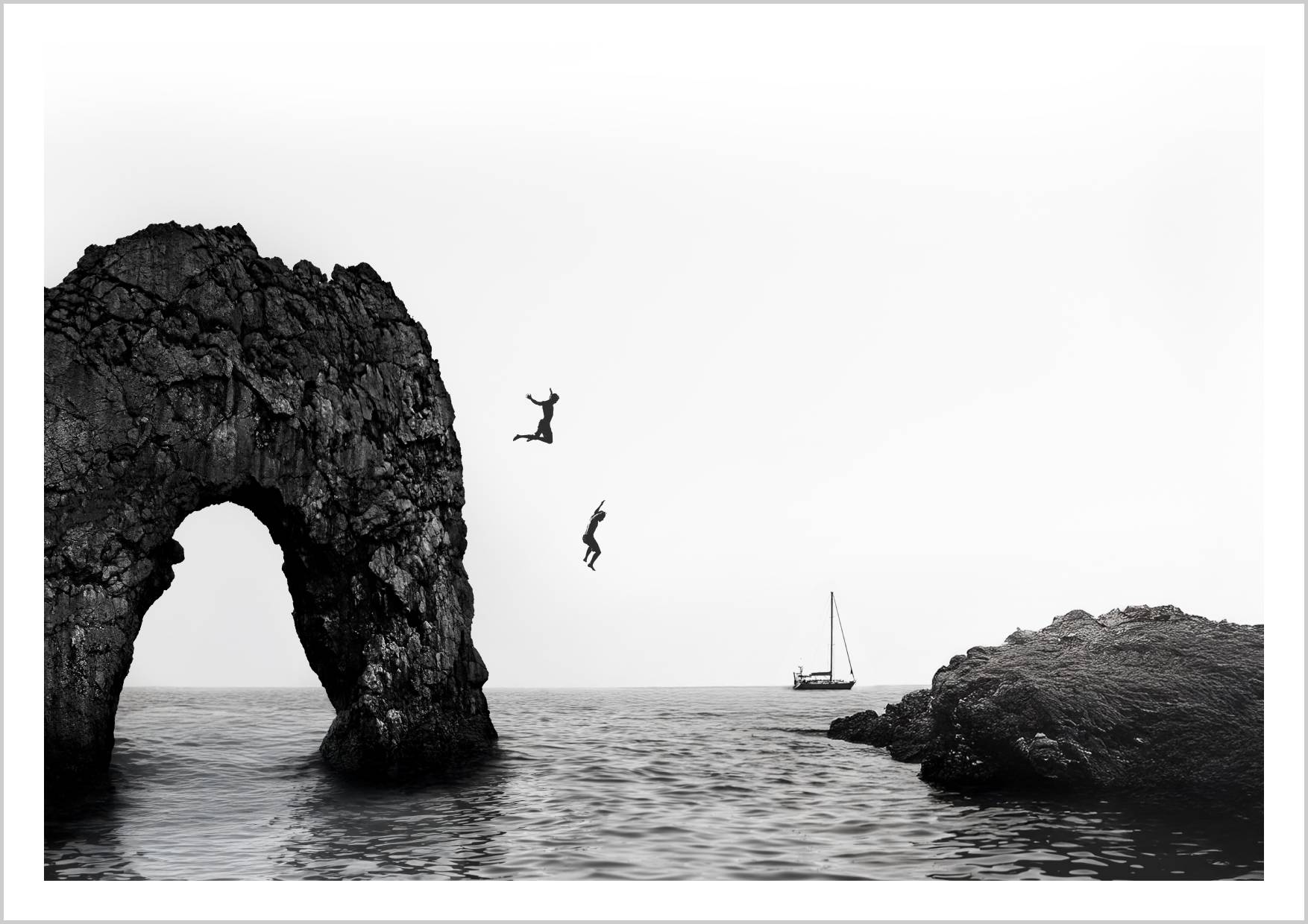Two figures jumping off a cliff into calm waters, with a sailboat in the background and rocky formations. – Arteve Gallery