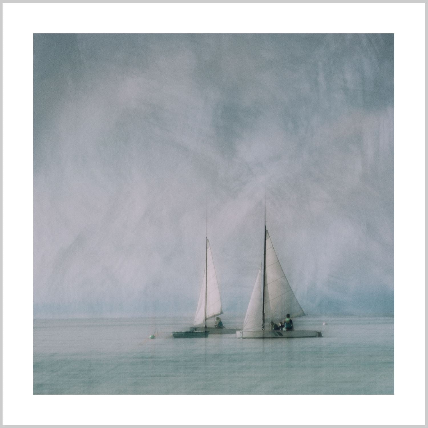 Two sailboats on calm water under a cloudy sky, with a painterly effect. – Arteve Gallery