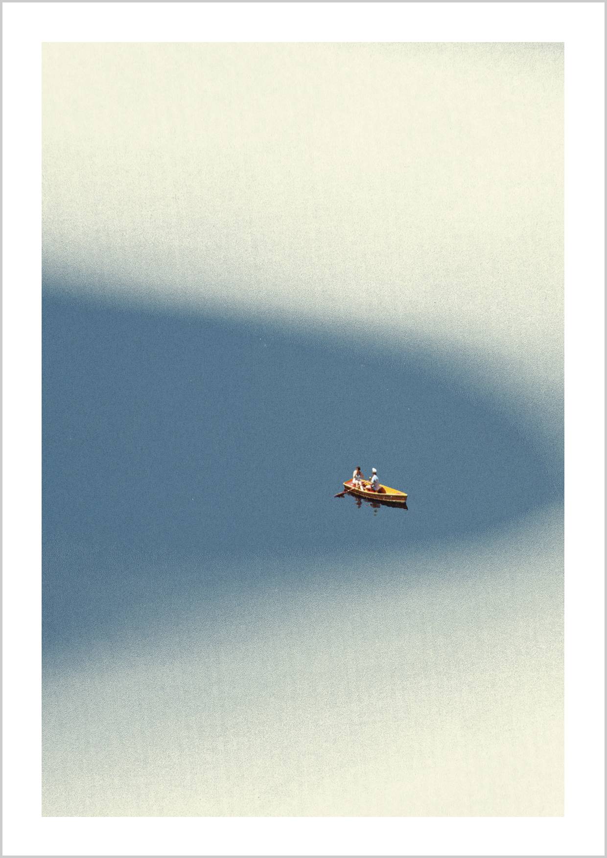 A small boat with two figures floats on a smooth, blue surface, surrounded by soft, muted colors. – Arteve Gallery