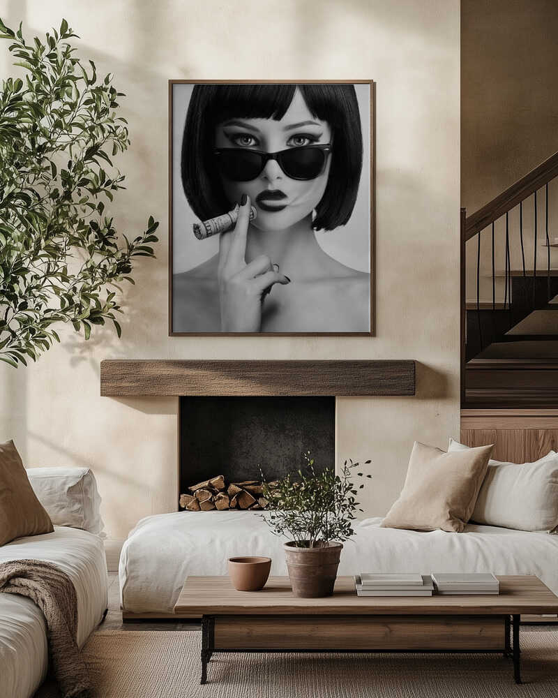 Dark shades, smoldering look, cigarette in hand. A portrait that’s sharp, cinematic, and effortlessly cool. This is rebellion captured in timeless black and white.
Artist: David Drake