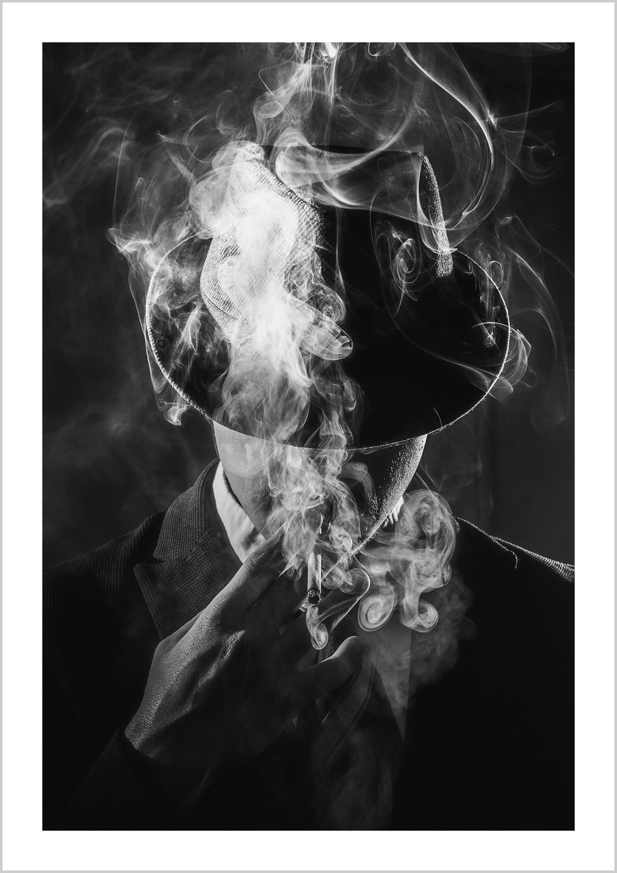 Man in hat smoking