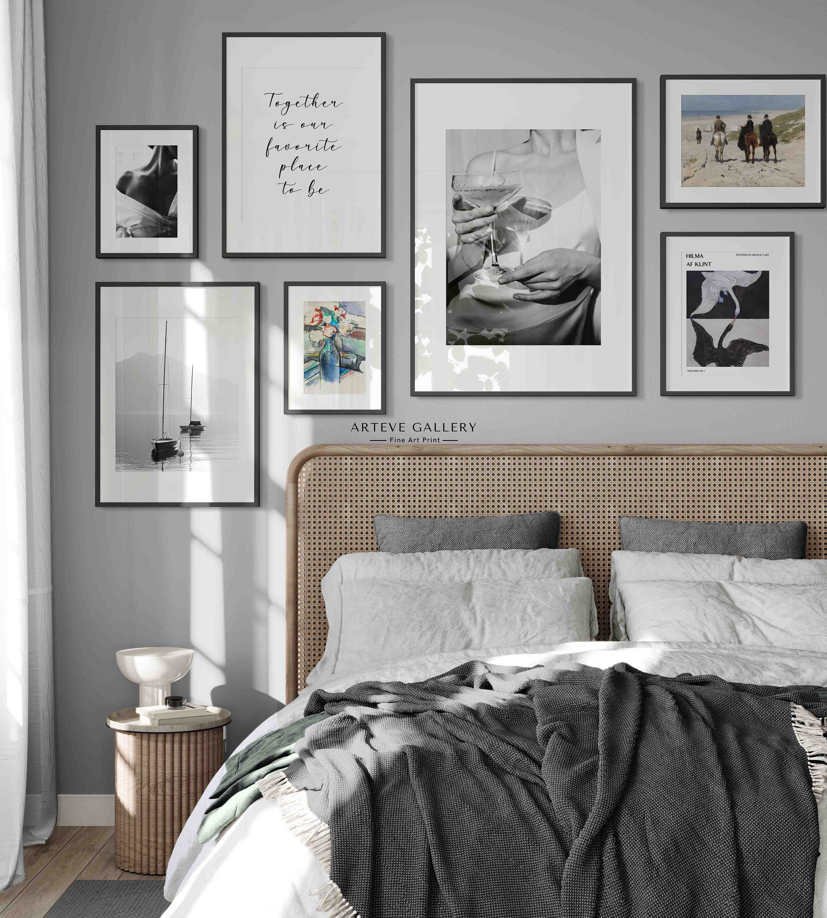 Photograph in black and white of a woman in a white shirt showing her shoulder. Sensual photo art is a style we love, and this Poster fits well with both other black and white photographs as well as botanical Posters.
