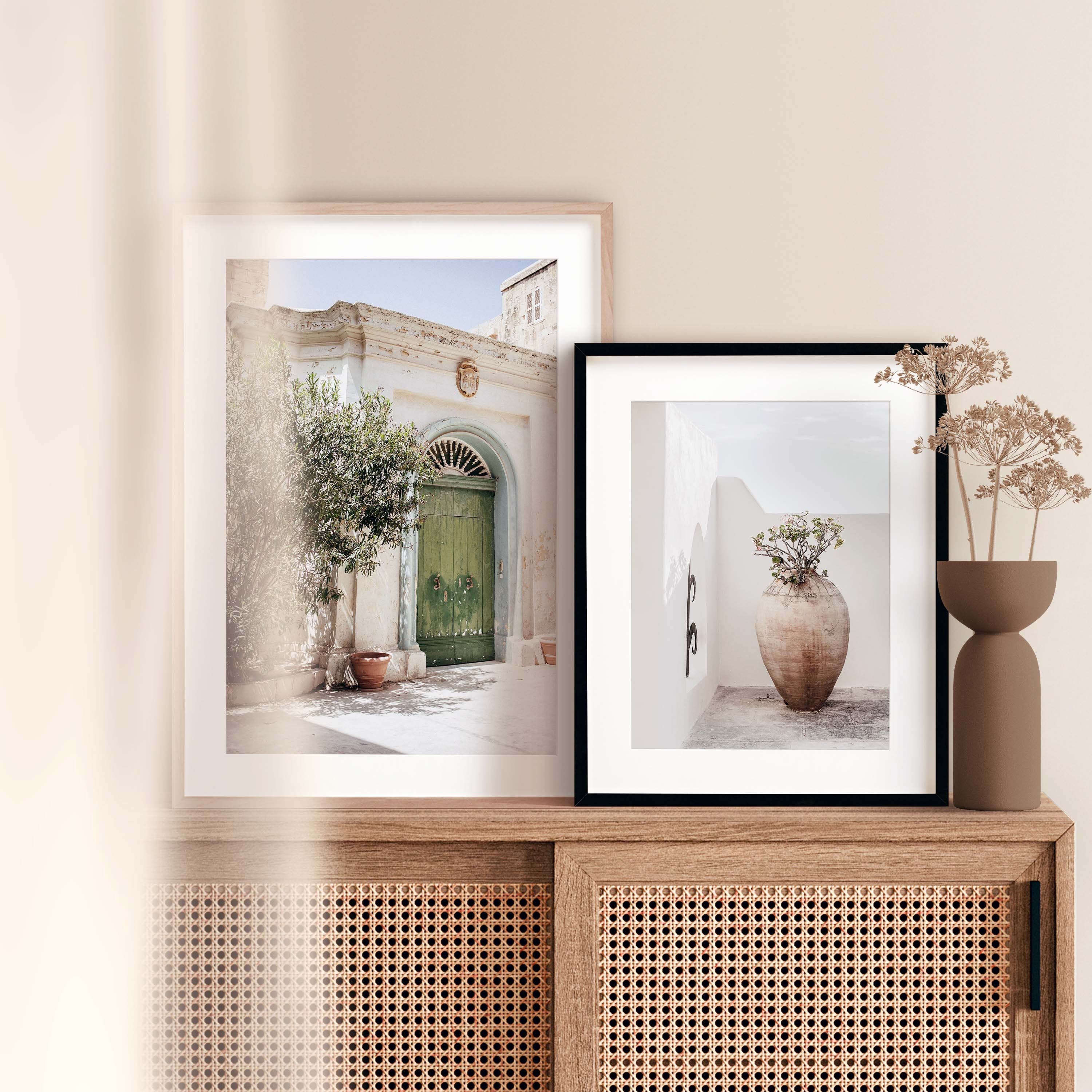 Poster in muted, balanced colors with a photograph of a large pot of flowers