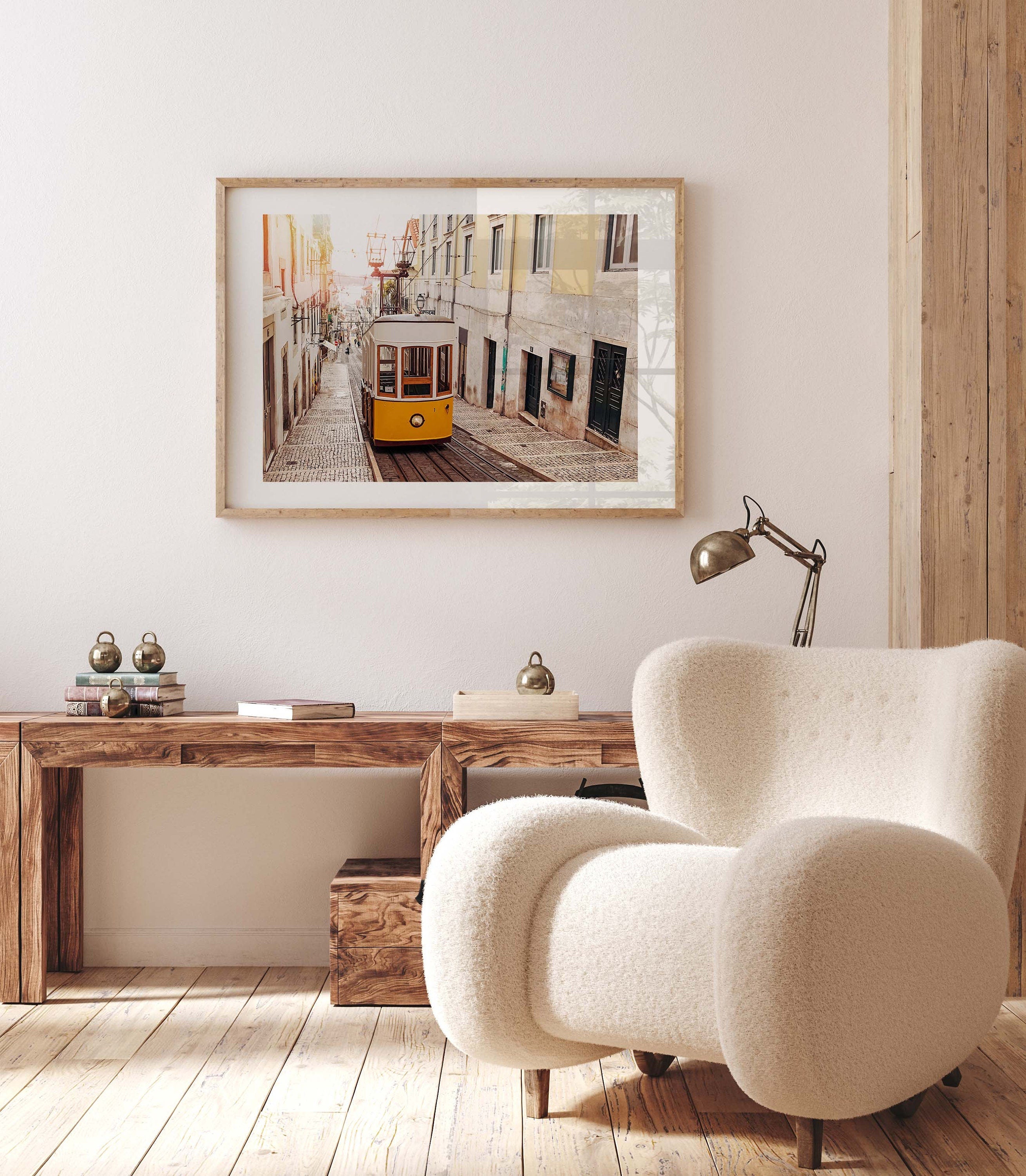 Photography of a yellow tram on an old street at Lisbon, Portugal with soft light of sunrise