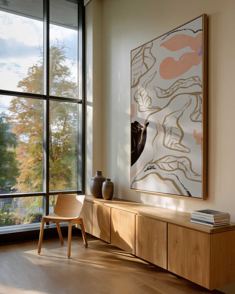 Minimal lines trace flowers and leaves above a dark hand, grounded by muted earth tones on soft beige. Subtle yet bold, this line-driven design works well in serene bedrooms or modern gallery walls. Artist: Arty Guava