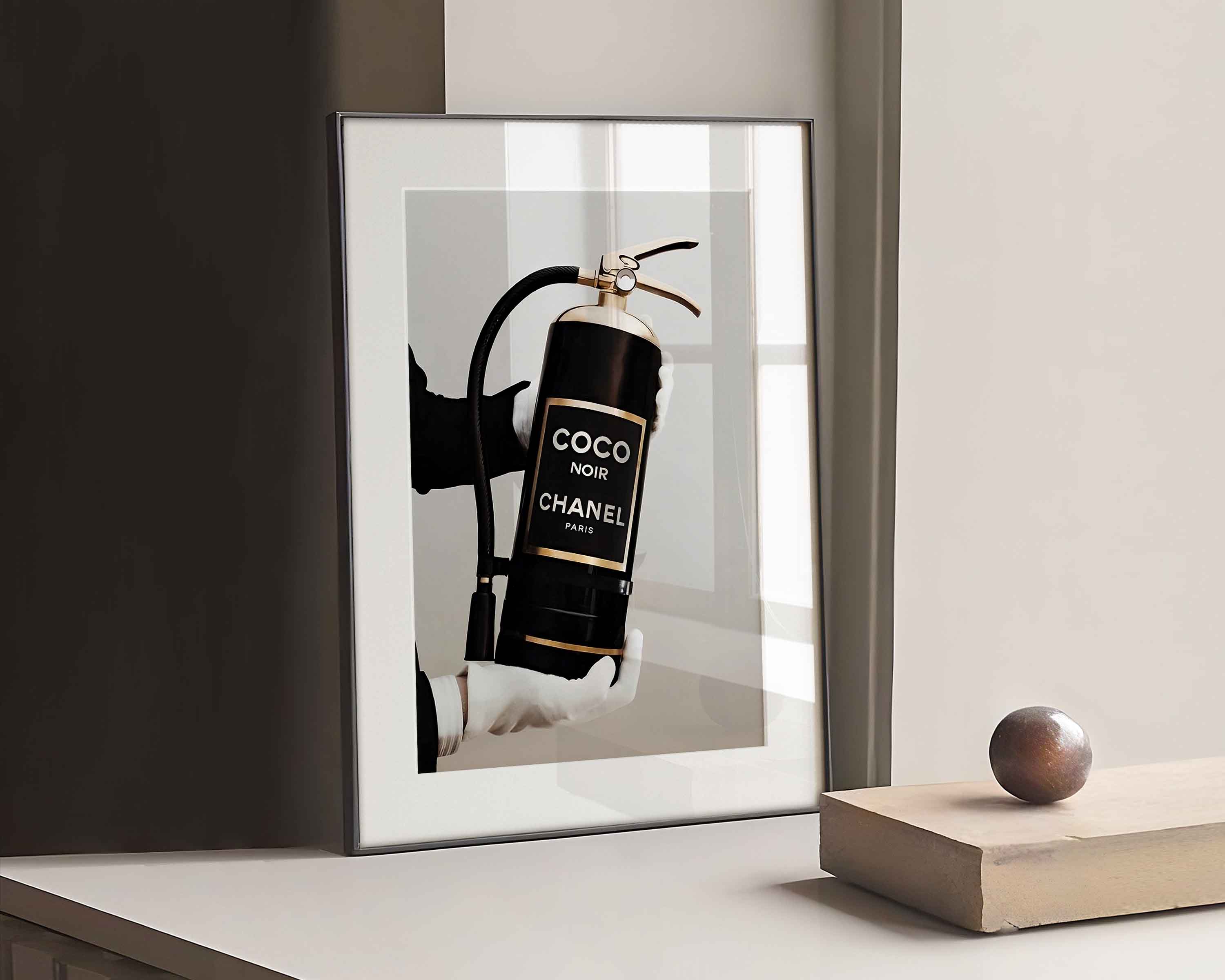 Black and white photography print of Coco Chanel fire extinguisher
