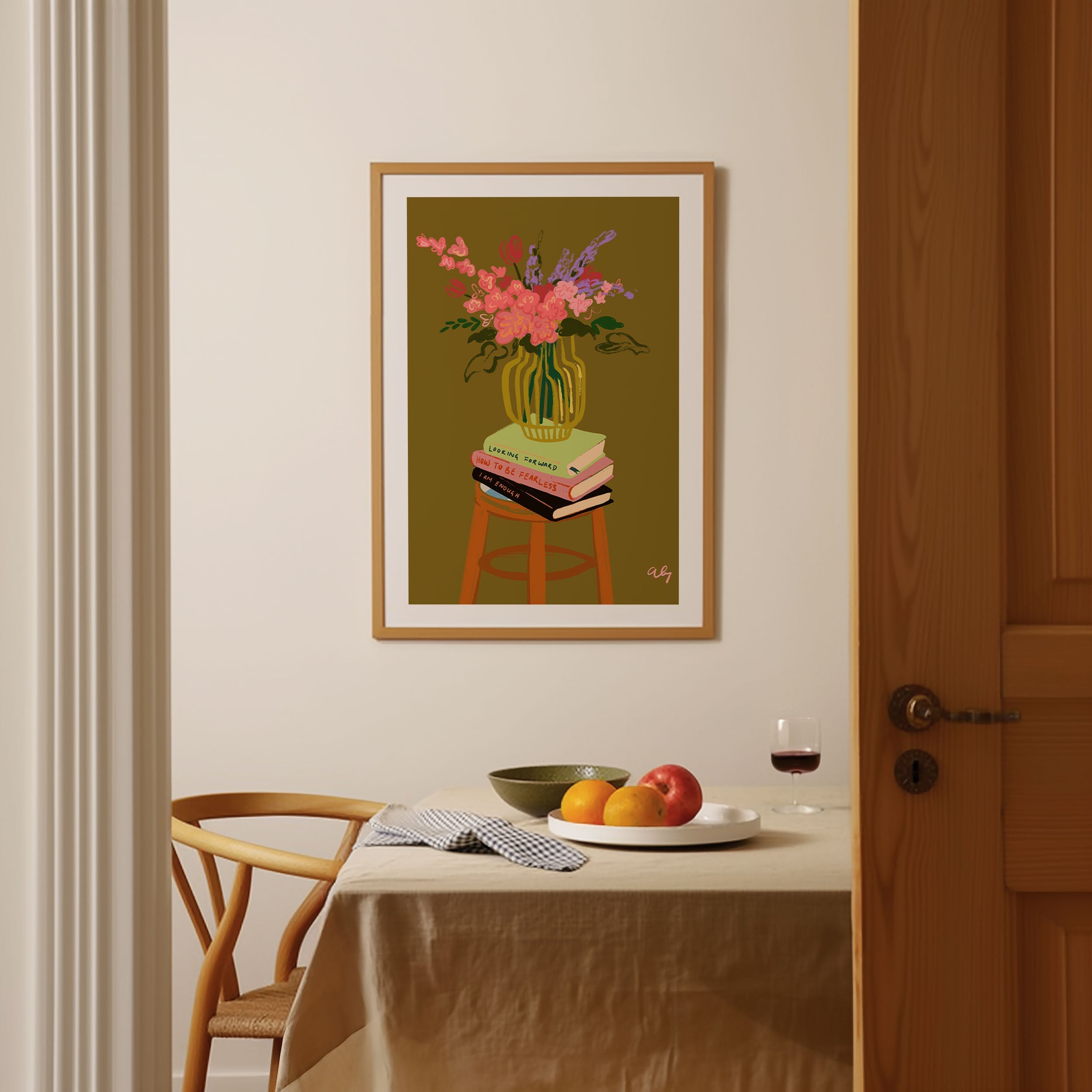 A lush bouquet of pink and purple blooms arranged in a green vase, resting atop a stack of books. With its warm olive background, this still life carries both elegance and homely charm — perfect for dining areas, kitchens, or cozy living spaces.
Artist: Arty Guava