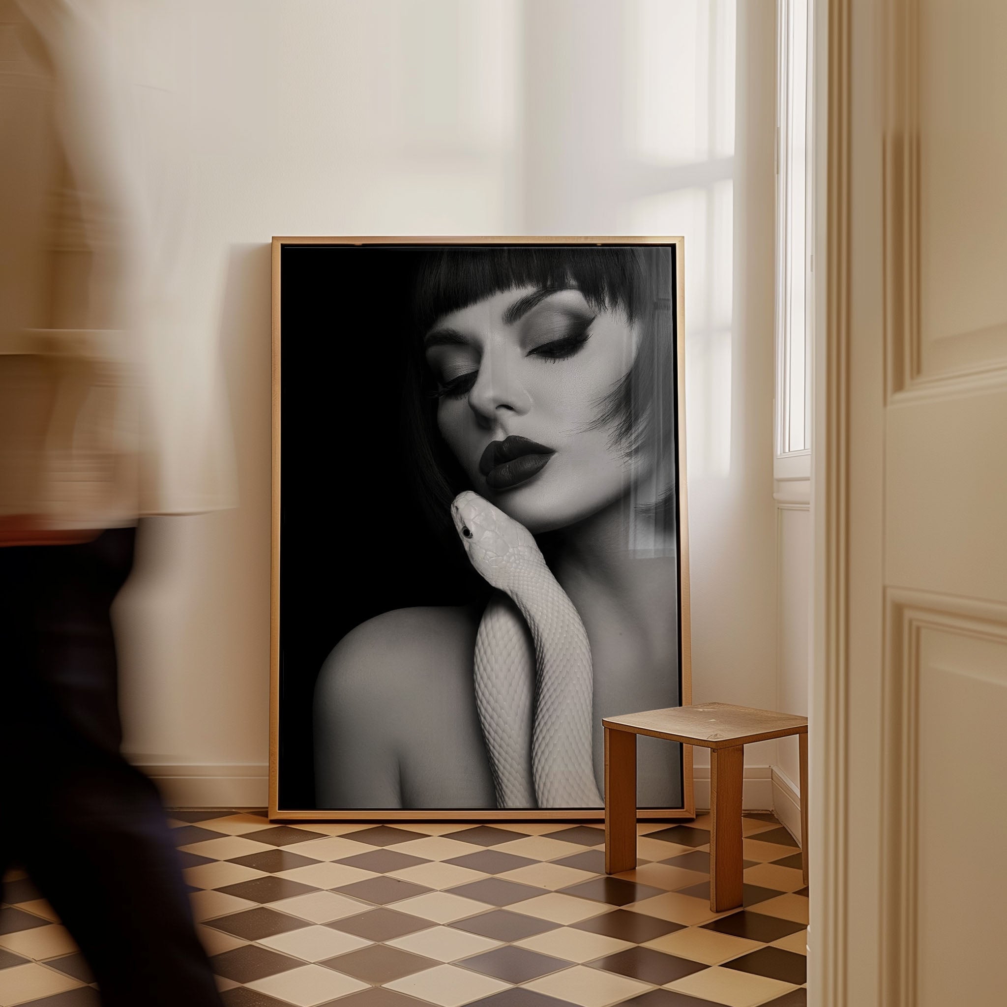 A woman and a snake — beauty wrapped in tension. Forbidden Embrace is minimal, provocative, and impossible to ignore.