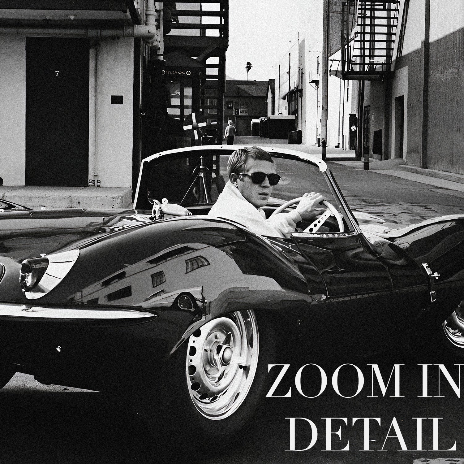 Steve McQueen driving his Jaguar