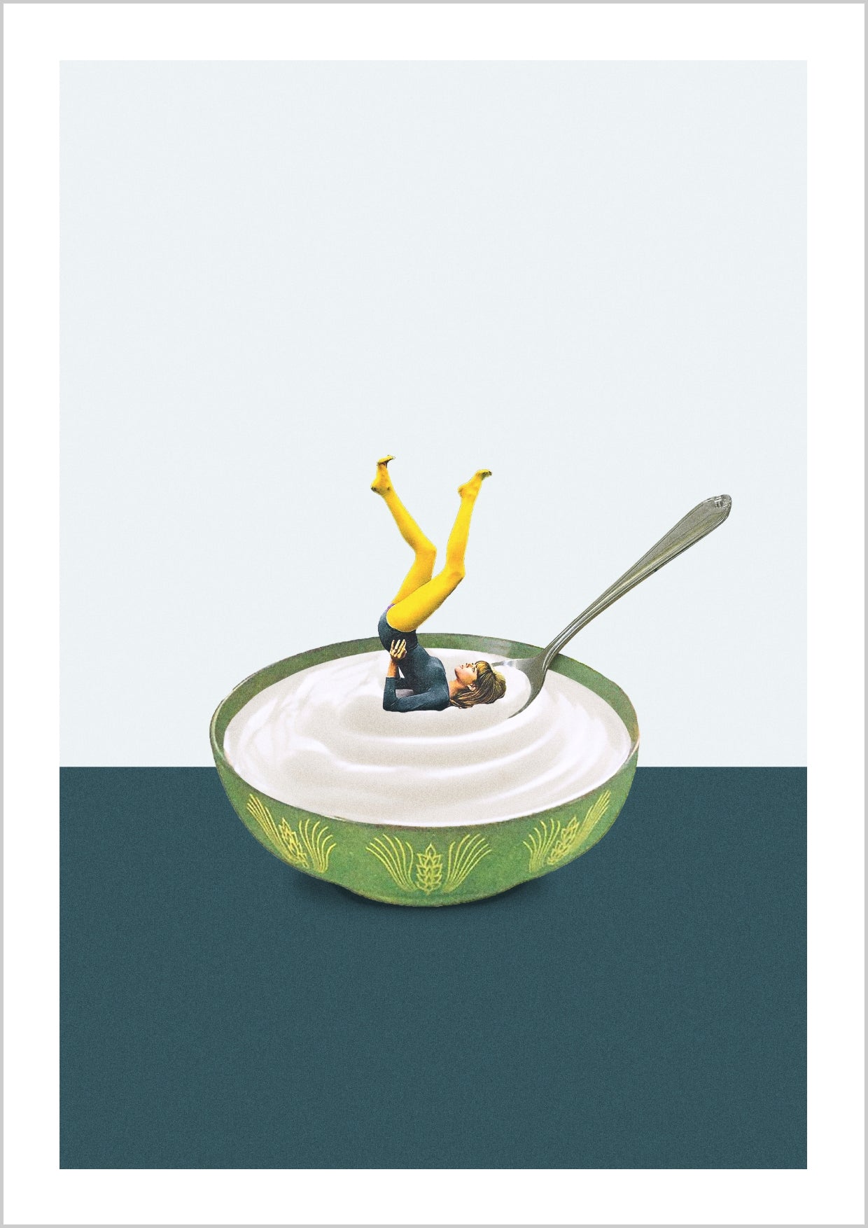 A miniature figure in a yoga pose inside a bowl of yogurt, with a spoon beside it. – Arteve Gallery