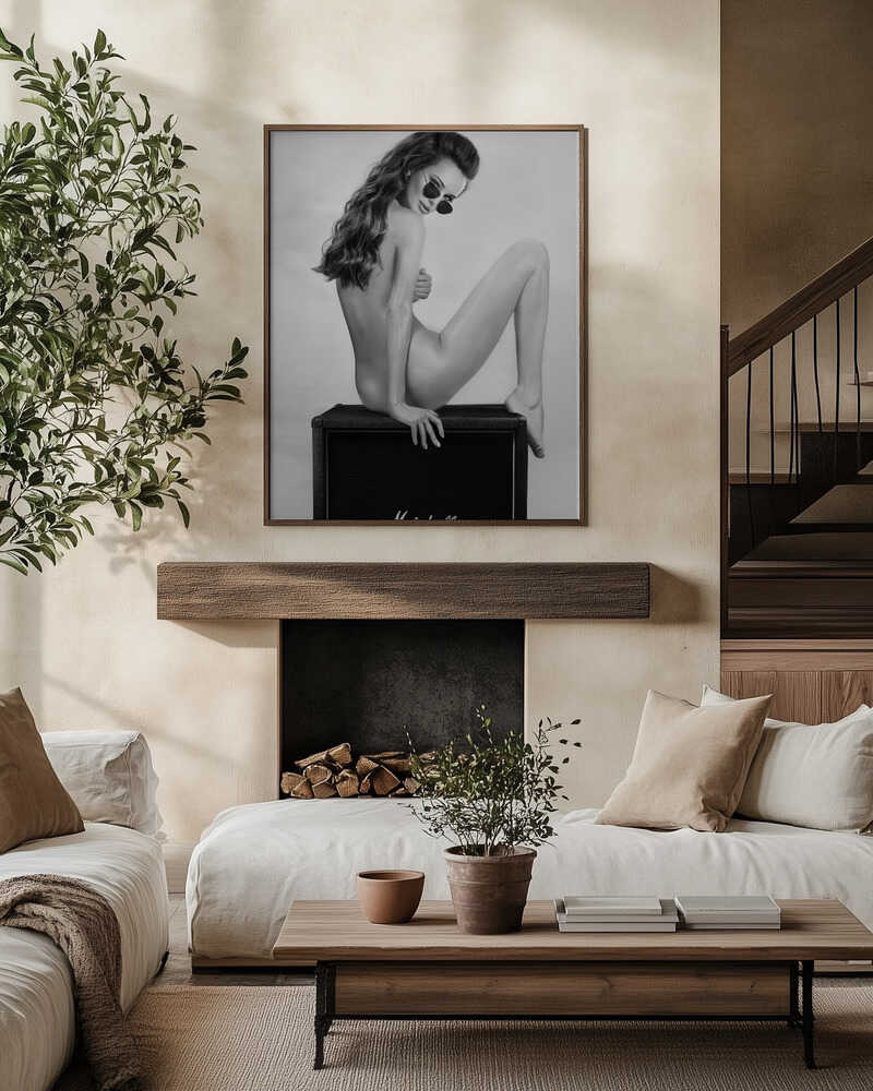 Perched on a Marshall amp with nothing but shades and attitude. This black-and-white artwork turns raw rock’n’roll energy into wall art — cheeky, stylish, and unapologetically bold.
Artist: David Drake